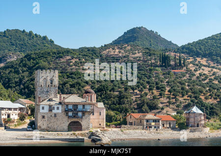 The old tower at the landing point for Zografou Monastery on the  Southwest coast of the Athos peninsula, Macedonia, Northern Greece Stock Photo