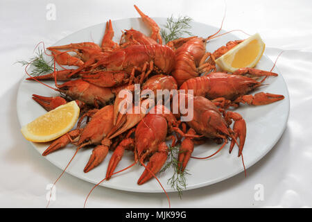 lobsters on dish with lemon Stock Photo