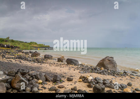 The beach of the Sea of Galilee near the church of the Primacy of Saint Peter, Tabgha, Israel Stock Photo