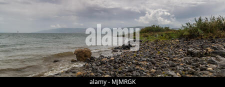 The beach of the Sea of Galilee near the church of the Primacy of Saint Peter, Tabgha, Israel. Panorama Stock Photo