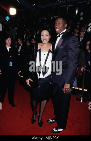 22 Feb 1998, Los Angeles, California, USA --- Original caption: 2/22/1998-Los Angeles, CA: Florence Griffith-Joyner and husband Al Joyner at the 12th Annual American Comedy Awards at the Shrine Exposition Center. --- ' Tsuni / Bourquard 'Florence Griffith-Joyner & Al Joyner Florence Griffith-Joyner & Al Joyner Florence Griffith-Joyner & Al Joyner Event in Hollywood Life - California,  Red Carpet Event, Vertical, USA, Film Industry, Celebrities,  Photography, Bestof, Arts Culture and Entertainment, Topix  Celebrities fashion /  from the Red Carpet-1994-2000, one person, Vertical, Best of, Holly Stock Photo