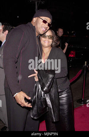 22 Oct 2000, Los Angeles, California, USA --- Original caption: Charlie's Angels Premiere was held at the Chinese Theatre on Hollywood Blvd in Los Angeles. --- ' Tsuni / Bourquard 'LL Cool J with WifeA LL Cool J with WifeA LL Cool J with WifeA Event in Hollywood Life - California,  Red Carpet Event, Vertical, USA, Film Industry, Celebrities,  Photography, Bestof, Arts Culture and Entertainment, Topix  Celebrities fashion /  from the Red Carpet-1994-2000, one person, Vertical, Best of, Hollywood Life, Event in Hollywood Life - California,  Red Carpet and backstage, USA, Film Industry, Celebriti Stock Photo