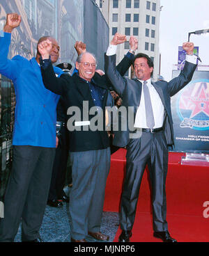 28 Apr 2000, Los Angeles, California, USA --- Irwin Winkler, Sylvester Stallone and Carl Wethers on the Hollywood Walk of Fame with their arms raised. --- ' Tsuni / USA 'Irwin Winkler and Sylvester Stallone Irwin Winkler and Sylvester Stallone inquiry tsuni@Gamma-USA.com Stock Photo