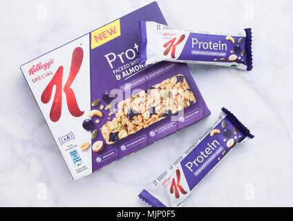 LONDON, UK - APRIL 27, 2018: Box of Kellog's Protein bar with seeds and fruits on marble background. Stock Photo