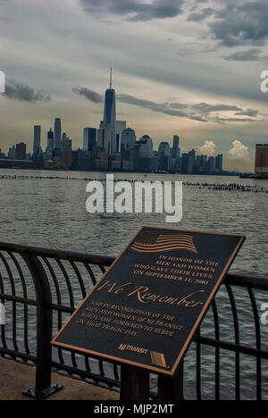 Looking across the Hudson towards Lower Manhattan from the 9/11 memorial plaque on the Hoboken Waterfront Stock Photo