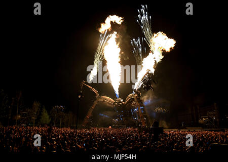 A giant, fire-breathing, 'Arcadia Spider' during the Metamorphosis show at Queen Elizabeth Park in London. Stock Photo