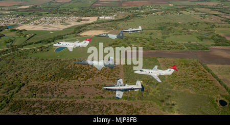 U.S. Air Force pilots assigned to the 560th Flying Training Squadron and the 99th Flying Training Squadron fly T-6 Texans, T-1 Jayhawks and T-38 Talons in a dissimilar formation in preparation for the 45th Annual Freedom Flyer Reunion over Joint Base San Antonio-Randolph, Texas, March 20, 2018. The Freedom Flyer Reunion is an annual celebration recognizing the incredible service of Air Force Prisoners of War during the Vietnam War, their honorable return, and their connection with the 12th Flying Training Wing during Operation Homecoming. Armed Forces and civilians displaying courage bravery d Stock Photo