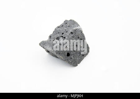 extreme close up with a lot of details of basalt rock isolated over white background Stock Photo