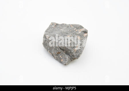 extreme close up with a lot of details of andesite volcanic rock isolated over white background Stock Photo