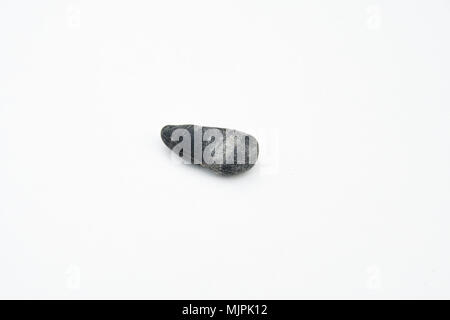 extreme close up with a lot of details of round stone isolated over white background Stock Photo