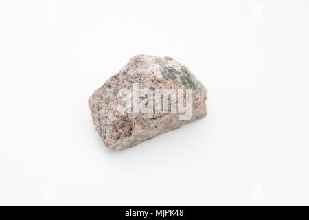 extreme close up with a lot of details of quartz syenite isolated over white background Stock Photo