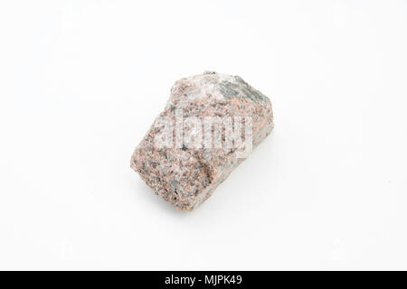 extreme close up with a lot of details of quartz syenite isolated over white background Stock Photo