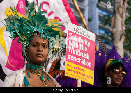 London, UK. 5th May, 2018. Supporters of the Windrush generation in traditional costume protest outside the Home Office to call for the scrapping of the 2014 Immigration Act. Credit: Mark Kerrison/Alamy Live News Stock Photo