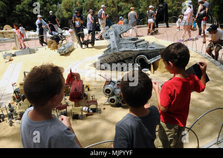 Winter Haven, Florida, USA, May 5, 2018.  Children view the Force Awakens MINILAND model display at LEGOLAND Florida resort in Winter Haven, Florida on May 5, 2018, the first day of LEGO Star Wars Days. The event is scheduled for three consecutive weekends in May and also features life-sized LEGO sculptures of Star Wars characters. (Paul Hennessy/Alamy) Stock Photo