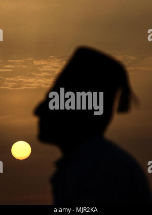 Members of the Samaritan community gather to attend an early morning Passover prayers to mark the end of the Passover holiday, atop Mount Gerizim, near the West Bank City of Nablus, 06 May 2018. The Samaritans, an ethnoreligious group of the Levant originating from the Israelites, or Hebrews, of the ancient near east, claim descent from the tribe of Ephraim and tribe of Manasseh (two sons of Joseph). According to the Torah, the Passover Sacrifice was first offered on the night of the Israelites' Exodus from Egypt. Photo: Ayman Nobani/dpa Stock Photo