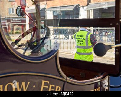 Crawley, UK. 6th May, 2018. Historic Commercial Vehicle Society marshal visible through windscreen of 1912 Belsize Van. Crawley’s High Street provided the half way stopping point for participants in the 57th Historic Commercial Vehicle London to Brighton run of 2018. Credit: N Pope - Editorial/Alamy Live News. Stock Photo