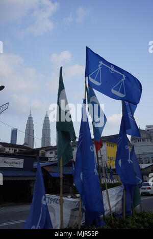 Kuala Lumpur, Malaysia. 6th May, 2018. The upcoming May 2018 general elections is expected to be a keenly contested fight between the ruling coalition party and the opposition parties. Flags of the political parties can be seen decorating the roads in Kampung Baru, Kuala Lumpur. Credit: Beaconstox/Alamy Live News. Stock Photo