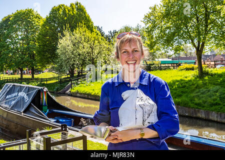 The Saltway, Droitwich, UK, 6th May 2018.  and a new sculpture by artist Katy Bienart arrives by canal barge. The sculpture represents the towns history as a salt production centre and the public where invited to fill the glass walls with salt from around the world. Credit: David Broadbent/Alamy Live News Stock Photo