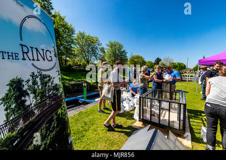 The Saltway, Droitwich, UK, 6th May 2018.  and a new sculpture by artist Katy Bienart arrives by canal barge. The sculpture represents the towns history as a salt production centre and the public where invited to fill the glass walls with salt from around the world. Credit: David Broadbent/Alamy Live News Stock Photo