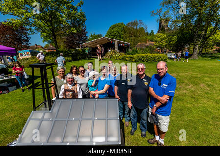 The Saltway, Droitwich, UK, 6th May 2018.  and a new sculpture by artist Katy Bienart arrives by canal barge. The sculpture represents the towns history as a salt production centre and the public where invited to fill the glass walls with salt from around the world. Credit: David Broadbent/Alamy Live News Stock Photo