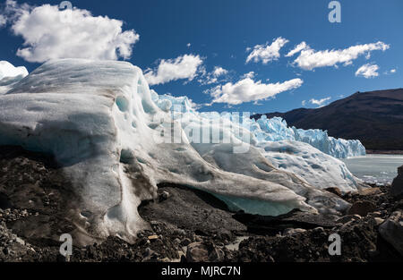 El Calyfate, Argentina - December 14, 2016: A man in sunglasses and hat looks out over the Perito Moreno Glacier at the start of a hike on the ice Stock Photo
