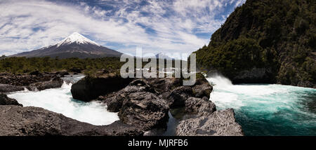 Panoramic view of Saltos del Petrohue waterfalls and Osorno Volcano in Vicente Perez Rosales National Park, near Puerto Varas, Chile Stock Photo