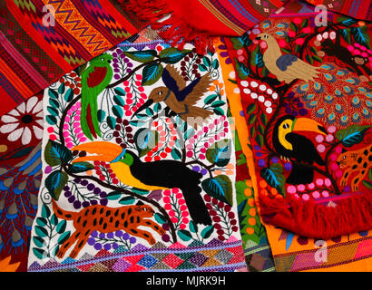 Zinacantan, Mexico - November 8, 2013: Close up of vibrantly coloured and intricately designed textiles typical of the indigenous Tzotzil Maya culure  Stock Photo