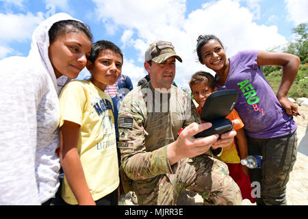 PUERTO CORTES, Honduras (March 21, 2018) Staff Sgt. Clark Luksan pilots a drone at the city's landfill during Continuing Promise 2018. U.S. Naval Forces Southern Command/U.S. 4th Fleet has deployed a force to execute Continuing Promise to conduct civil-military operations including humanitarian assistance, training engagements, and medical, dental, and veterinary support in an effort to show U.S. support and commitment to Central and South America. Armed Forces and civilians displaying courage bravery dedication commitment and sacrifice Stock Photo
