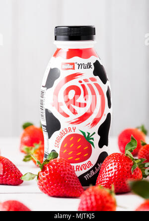 LONDON, UK - MAY 03, 2018: Plastic bottle of Muller strawberry drink on white. Stock Photo