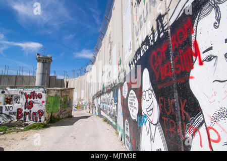 Graffiti at the Israeli West Bank barrier in Betlehem Stock Photo