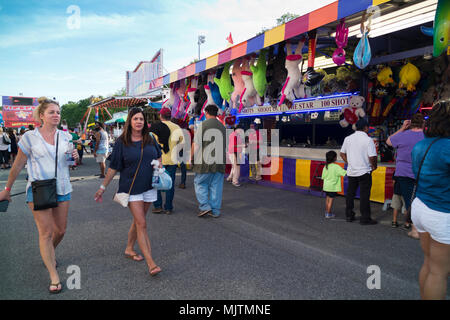 People on the carnival midway at the 14th annual Hot Air Balloon Festival at Foley, Alabama, USA Stock Photo