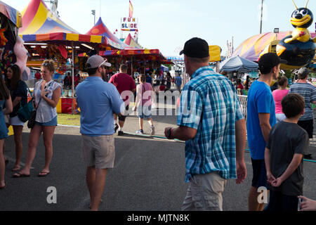 People on the carnival midway at the 14th annual Hot Air Balloon Festival at Foley, Alabama, USA Stock Photo