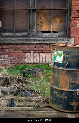 Exterior of an abandoned, decaying red brick industrial building Stock Photo