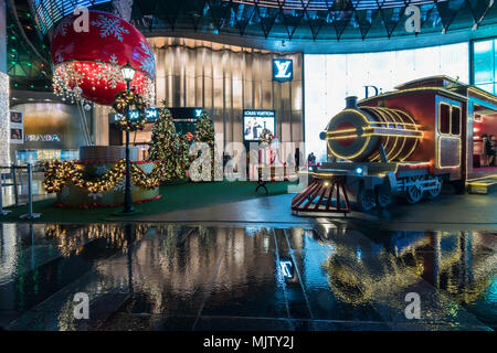 During Christmas season, the halls, malls and the entire stretch of Orchard Road are decked with glittering lights and stardust. Stock Photo