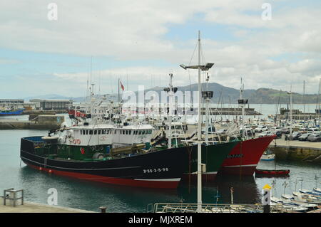 Fishing Boats Moored In The Harbor Of The Fortified Village Of Getaria. Fishing Average Age Travel. March 26, 2018. Getaria Guipuzcoa Basque Country S Stock Photo