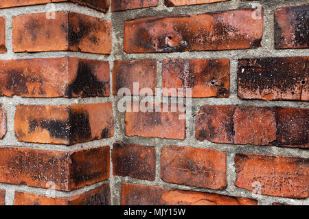 Red brick wall with corner. Stock Photo