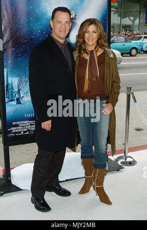 Tom Hanks and wife Rita Wilson arriving at the Polar Express Premiere at The Grauman Chinese Theatre in Los Angeles. 11/07/2004.           -            02-HanksTom WilsonRita087.JPG           -              02-HanksTom WilsonRita087.JPG02-HanksTom WilsonRita087  Event in Hollywood Life - California,  Red Carpet Event, Vertical, USA, Film Industry, Celebrities,  Photography, Bestof, Arts Culture and Entertainment, Topix Celebrities fashion /  from the Red Carpet-, Vertical, Best of, Hollywood Life, Event in Hollywood Life - California,  Red Carpet , USA, Film Industry, Celebrities,  movie celeb Stock Photo