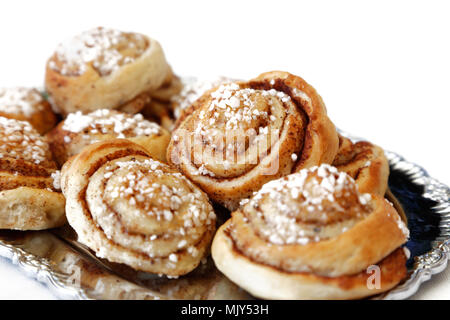 Cinnamon buns on a plate Stock Photo