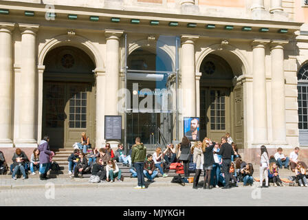 STOCKHOLM, SWEDEN - APRIL 14: Gamla Stan. Visitors near the Swedish Academy. This building also houses the Nobel Library and the Nobel Museum. Stock Photo