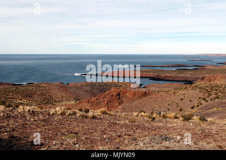 Geology and Geological features and rock structure on the beach and coast of Cabo Dos Bahias, near Camarones, Chubut Province, Argentina, Patagonia. Stock Photo