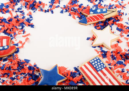 Patriotic confetti background of 4th of July. Independence Day concept. Isolated white background Stock Photo