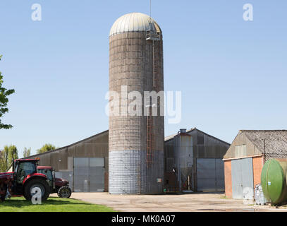 Large storage tower silo in farmyard Wickham Market, Suffolk, England, UK Stock Photo