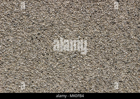 Texture of a wall with granite chips, background Stock Photo