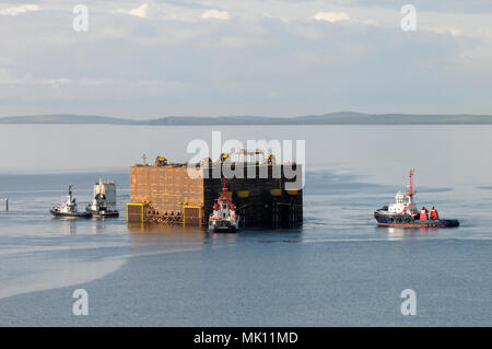 Heavy lifting vessel Xiang Yun Kou delivering a part of the Clair ridge project to the north sea and having it unloaded by submerging herself. Stock Photo