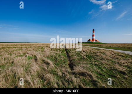 Sankt Peter-Ording, Germany - April 17, 2018: The view of the Westerhever lighthouse. Stock Photo