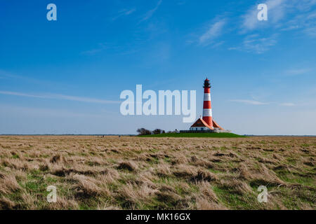 Sankt Peter-Ording, Germany - April 17, 2018: The view of the Westerhever lighthouse. Stock Photo