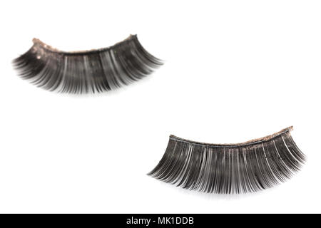 Use artificial eyelashes macro Isolated on ,Through the use of eyelashes Stock Photo