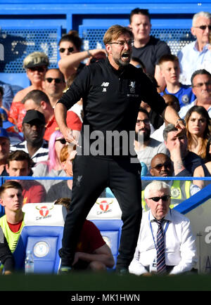 Liverpool manager Jurgen Klopp gestures on the touchline during the Premier League match at Stamford Bridge, London. Stock Photo