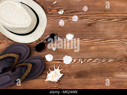 Beach and vacation items on wooden table. Top view with copy space Stock Photo