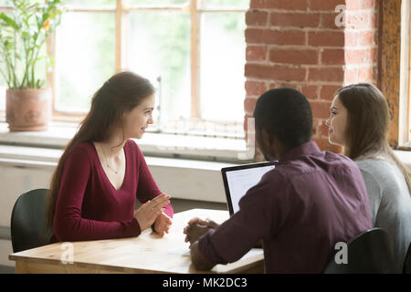 Female applicant having interview in modern office Stock Photo